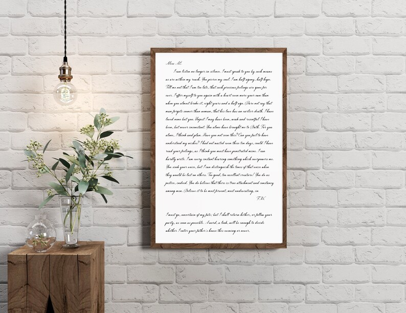 Puede incluir: Una impresi&oacute;n enmarcada con una carta manuscrita en tinta negra sobre papel blanco. La carta es un mensaje personal con un tono sincero. El marco es de madera marr&oacute;n con un passe-partout blanco.