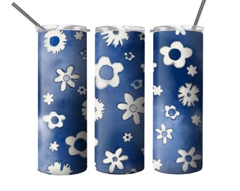 May include: Three stainless steel tumblers with lids and straws. The tumblers are blue with a white floral pattern.