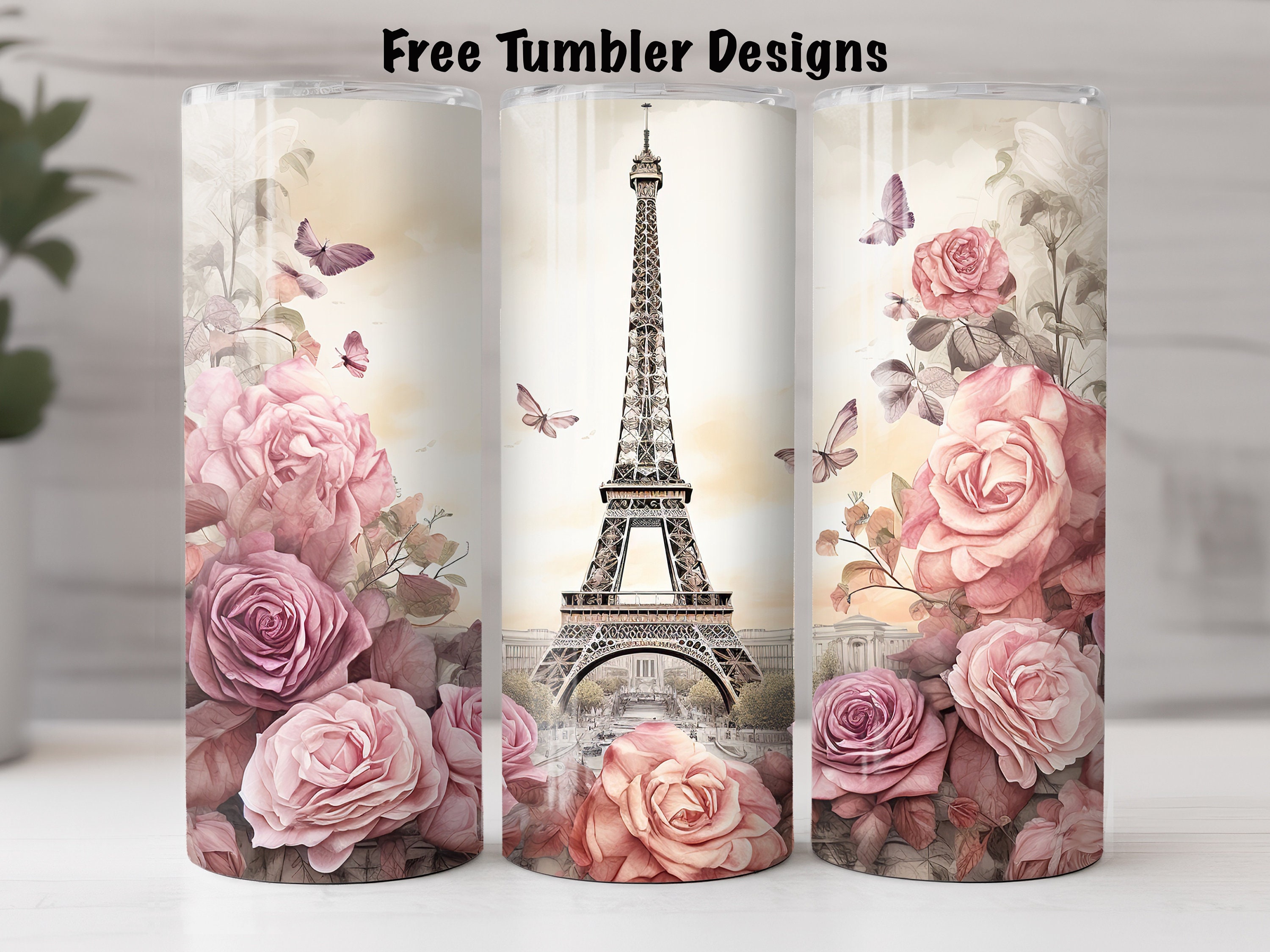 Romantic, dramatic flower arrangements - lots of roses in Eiffel tower  vases spray painted mat…