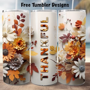 May include: Three white tumblers with a fall floral design. The center tumbler has the word "THANKFUL" in orange and brown letters.