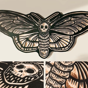 CARVED woodcut Death Head Moth wall hanging.