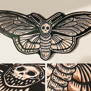 CARVED woodcut Death Head Moth wall hanging.