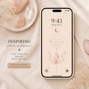 May include: A smartphone displaying a digital wallpaper with a beige background, a crescent moon, stars, and a central crystal illustration. The text reads: You are becoming everything you dream of. The screen shows the time 9:41 and date Monday, May 20.