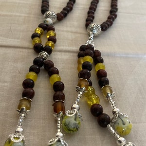 Cypress wood Juzu with yellow glass beads