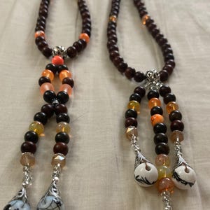 Large dark brown Rosewood Juzu with orange glass beads