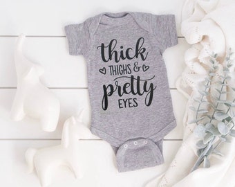 thick thighs and pretty eyes onesie