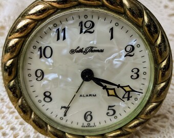 Vintage 1950s, Seth Thomas, Wind Up, German Miniature Brass Alarm Clock, Midcentury. Mother of Pearl Face with Rope Like Brass Trim.
