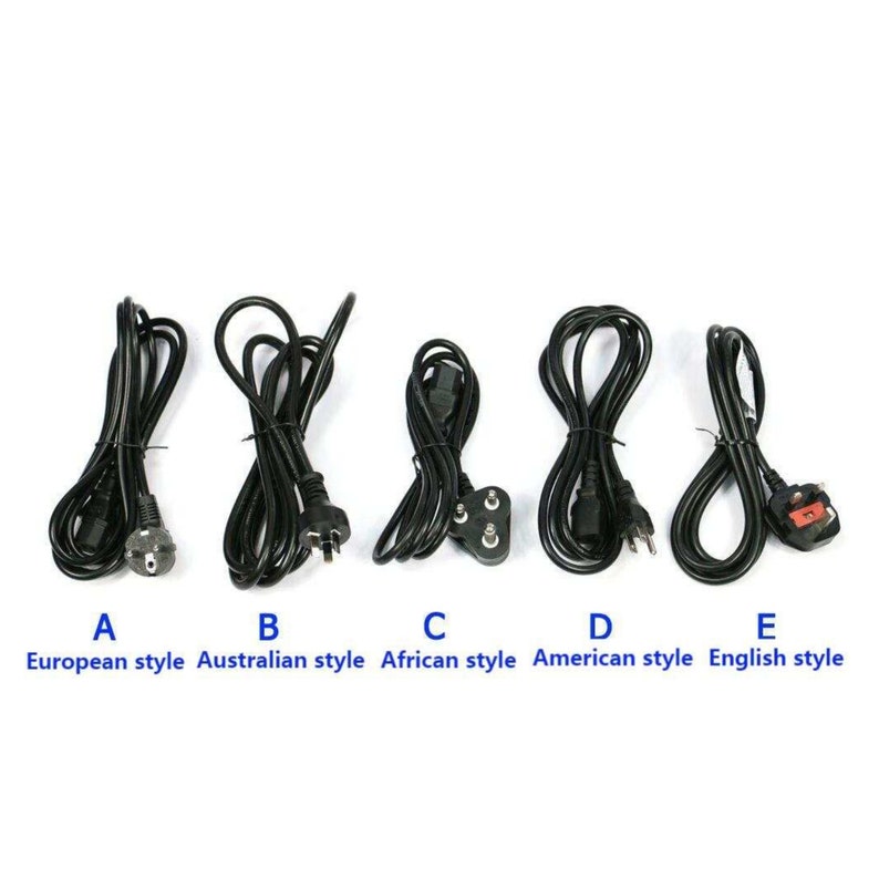 May include: Five black power cords with different plug styles are displayed against a white background. The cords are labeled A through E, with descriptions including European, Australian, African, American, and English styles. The cords are coiled.