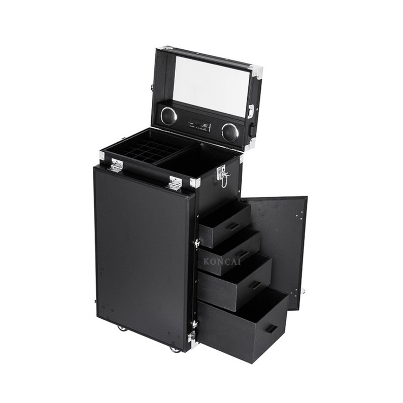 May include: A black rolling makeup case with multiple compartments, drawers, and a mirror. The case has silver-colored corner protectors and a handle. The open drawers reveal storage space. The case is designed for professional makeup artists.