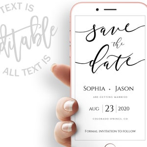 May include: A white smartphone screen with black text that reads "Save the Date" in a cursive font. The text "Sophia + Jason" is below the date, followed by "Are Getting Married". The date is "Aug 23 2020" and the location is "Colorado Springs, CO". The text "Formal Invitation to Follow" is at the bottom of the screen.