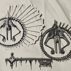 Ivory Ouroboros (White/Black) Graphic Tee/Pin Bundles by The Rising King LLC