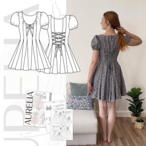 Peut inclure: Une robe &agrave; carreaux noirs et blancs avec des manches bouffantes et un dos lac&eacute;. L'image montre &eacute;galement un patron de couture et une personne portant la robe. Le patron est intitul&eacute; "AURELIA".