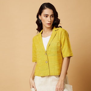 Cruelty-free silk & cotton handloom fabric/ Notch collar half-sleeves top with coconut button/ Relaxed fit/ Casual wear/ Collared tops