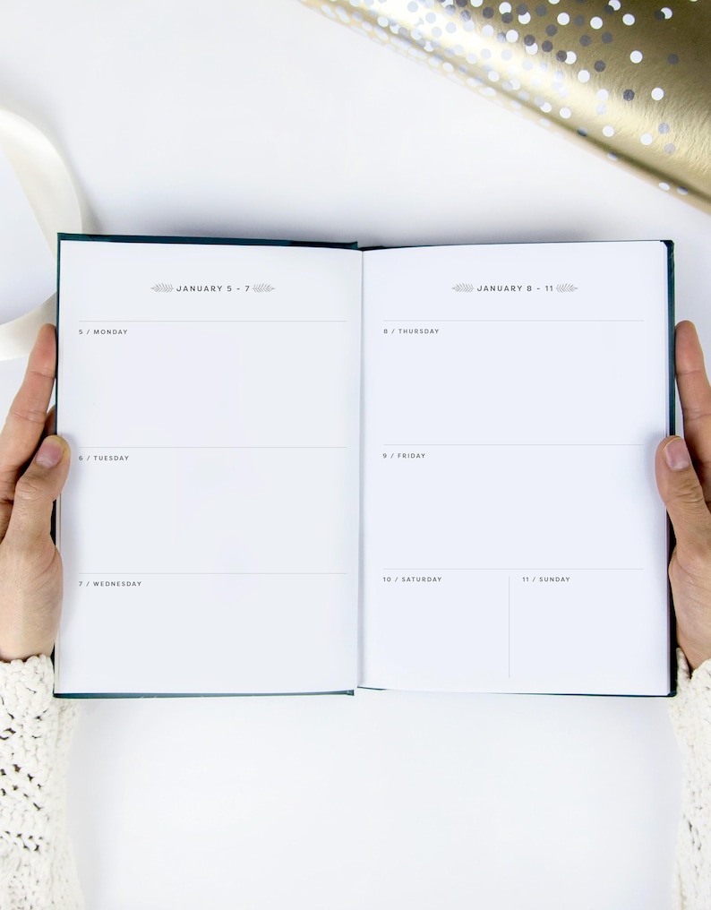 Weekly planner with lots of room for writing and journaling. Design is clean and minimal.