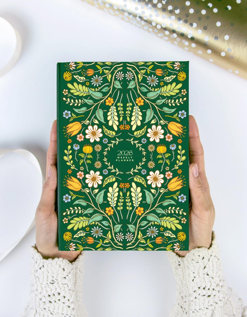 2026 hardcover planner book with folk illustration
