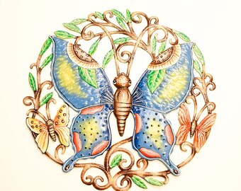 May include: A blue, yellow and orange metal butterfly wall decoration with intricate details. The butterfly is surrounded by a decorative metal vine with leaves.