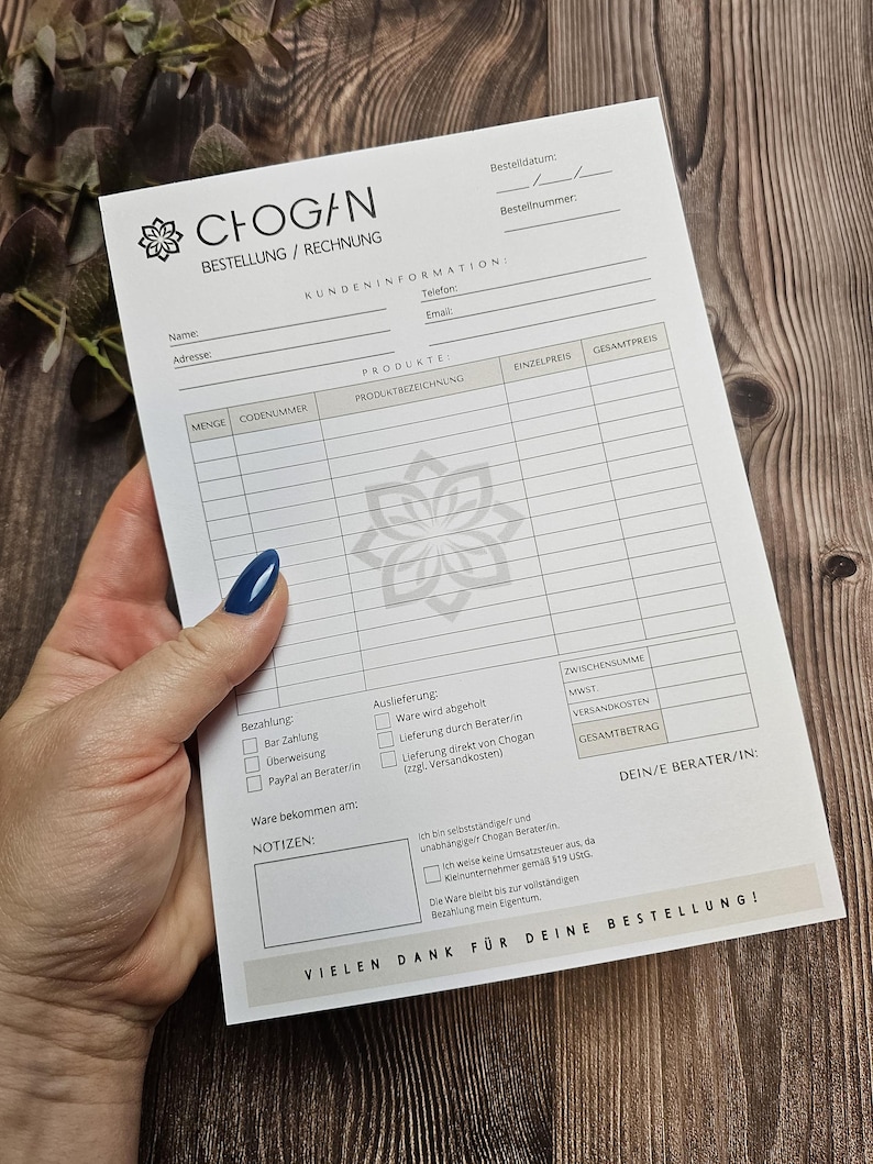 May include: A white order form with the company name "CHOGAN" printed at the top. The form includes sections for customer information, product details, payment options, and delivery preferences. The form also includes a section for the customer's consultant's information.