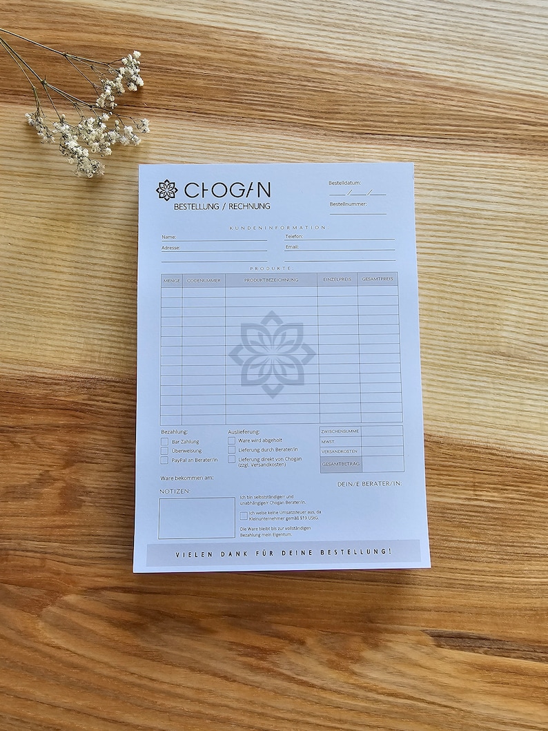 May include: A white order form with the text "CHOGAN BESTELLUNG/RECHNUNG" at the top. The form includes sections for customer information, product details, payment options, and delivery preferences. It also includes a section for notes and a space for the customer's consultant's information.