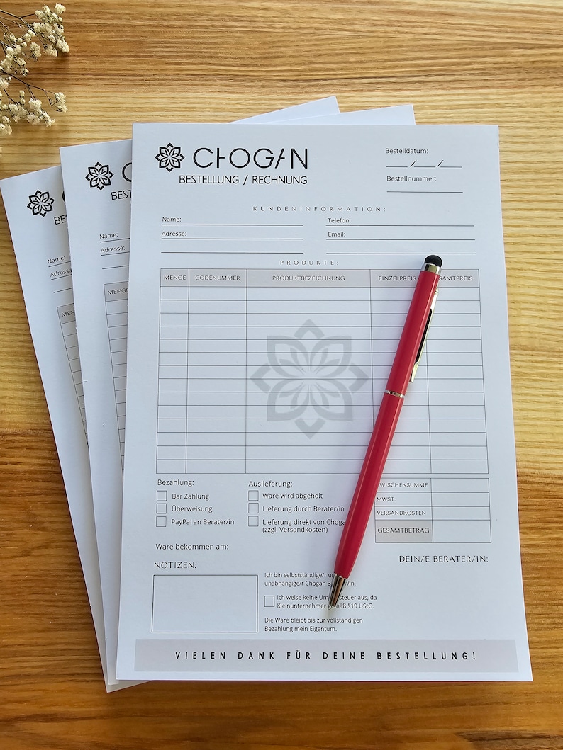 May include: A white order form with the text "CHOGAN BESTELLUNG / RECHNUNG" at the top. The form has sections for customer information, products, payment, and delivery. The form also includes a section for notes and a space for the customer's consultant's name.