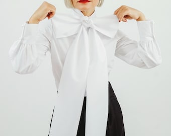 White Cotton Statement Bow Tie Shirt Minimalist Elegant Fitted Blouse Balloon Sleeves Convertible Bow to Long Scarf Business & Occasion Wear