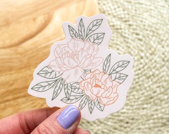 May include: A white sticker with a line drawing of two pink peonies and green leaves.