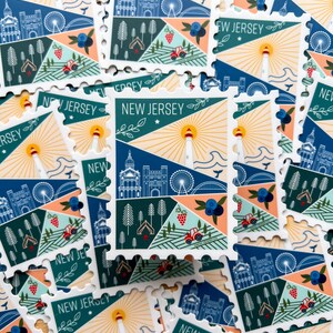 May include: A collection of colorful New Jersey themed stickers with a lighthouse, Ferris wheel, and other landmarks. The stickers are arranged in a random pattern and have a white border with a scalloped edge.