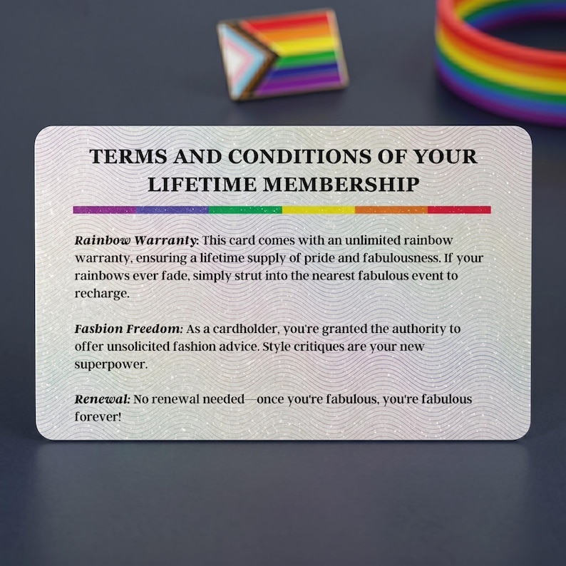 Back view of the 'GAY CARD' displaying 'TERMS AND CONDITIONS OF YOUR LIFETIME MEMBERSHIP' with humorous text about 'Rainbow Warranty' and 'Fasbion Freedom'.