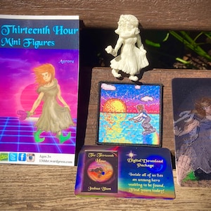 May include: A set of collectible figurines and digital downloads based on the "The Thirteenth Hour" series. The set includes a white figurine of a woman in a dress, a patch with a sunset scene, a card with a woman in a blue dress, and a card with the text "The Thirteenth Hour" and "Digital Download Package".