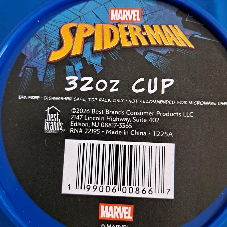 May include: A blue Spider-Man cup with the Marvel logo. The cup is labeled "32oz CUP" and is BPA free. The cup is dishwasher safe and top rack only. The cup is not recommended for microwave use.