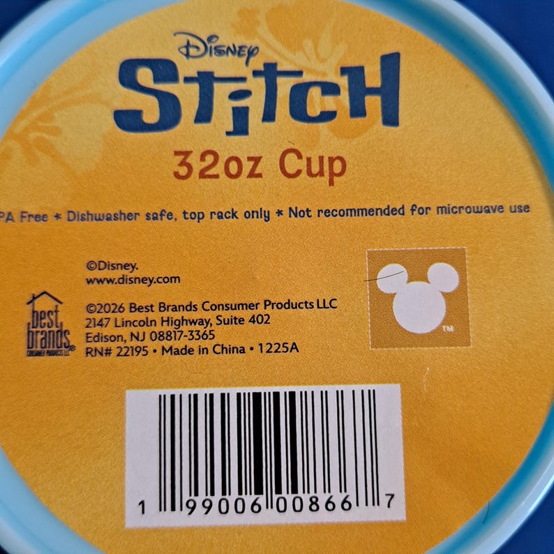 May include: A blue and yellow Disney Stitch 32oz cup. The cup features the Disney Stitch logo and the text "32oz Cup". The cup is BPA free and dishwasher safe. The cup is not recommended for microwave use.