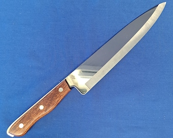 May include: A stainless steel kitchen knife with a brown wooden handle. The blade is sharp and the handle has a smooth finish.