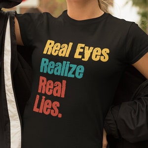 Real Eyes Realize Real Lies T-Shirt: Political Opinion Gift