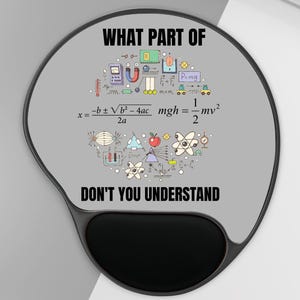 May include: Gray ergonomic mouse pad with a black wrist rest. The pad features the text "WHAT PART OF DON'T YOU UNDERSTAND" and mathematical equations and diagrams. A white keyboard is in the background.