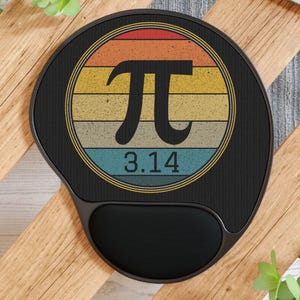 May include: Black ergonomic mouse pad with a retro design featuring the Pi symbol and the number 3.14 in a circular design with orange, yellow, and blue stripes. The pad has a built-in wrist rest.