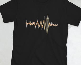 Camiseta unisex de manga corta con diseño de ondas gravitacionales de Sheldon LIGO y evaporación de The Allowance.
