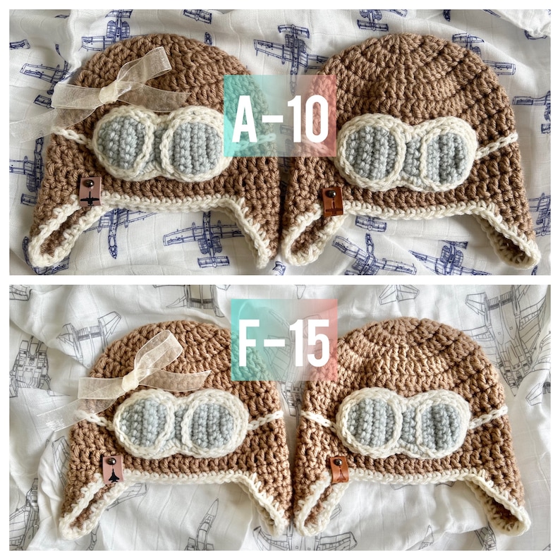 May include: Two brown crocheted aviator hats with white faux fur trim and blue felt goggles. The hats are labeled "A-10" and "F-15".