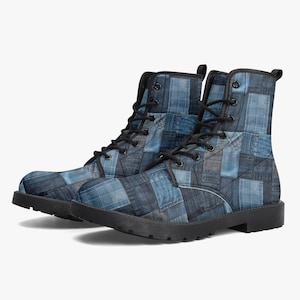 May include: A pair of blue denim patchwork combat boots. The boots feature a mix of denim patches in various shades of blue, with black laces and soles. The boots have a classic lace-up design and a sturdy, durable construction.