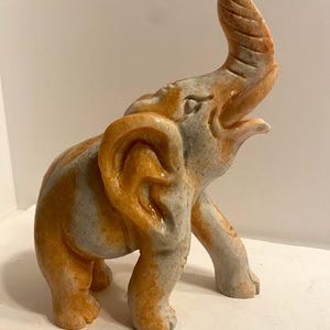 Carved stone elephant gray and orange tones ~ highly detailed carving 7.5x5.5