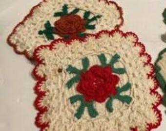 Crochet Hot Pads 1. cream with rose 2. green butterfly