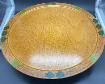 Mesa giratoria de madera con hojas pintadas a mano