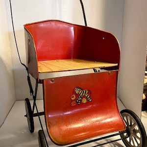 Antique/Vintage collapsible metal baby doll stroller with rubber wheels