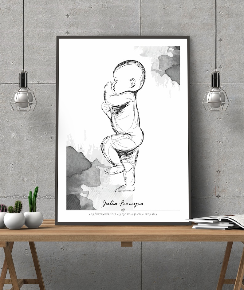 May include: Black and white illustration of a baby standing with a watercolor background. The text "Julia Ferreira" is below the illustration with the date "23 September 2017", weight "3.610 kg", height "52 cm", and time "12:03 AM".