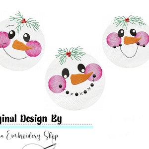 May include: Three embroidered snowman faces with pink cheeks, black eyes, and orange noses. The snowman faces are white with a green holly sprig on top.