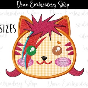 May include: Embroidered design of a cartoon cat with a pink and red mohawk, green and brown eyes, and a pink nose. The cat is wearing a yellow and white checkered shirt. The design is available in three sizes.