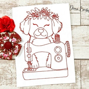 May include: Line art embroidery design of a dog wearing a flower crown and sitting on a sewing machine. The design is in red thread on a white background.