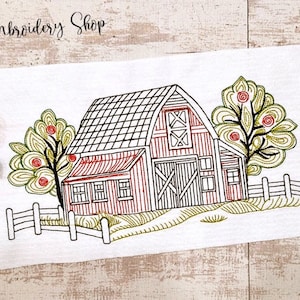 May include: Embroidered design of a red barn with a white roof and black trim. The barn has a large door and two windows. There are two green trees with red apples on each side of the barn. A black fence is in front of the barn.