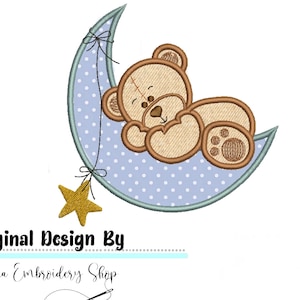 May include: Embroidered design of a brown teddy bear sleeping on a blue crescent moon with white polka dots. A gold star hangs from the moon.