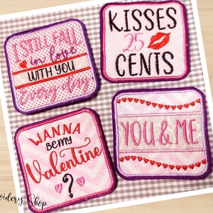 May include: Four pink and purple Valentine's Day themed embroidered patches with different sayings. The patches read "I still fall in love with you every day", "Wanna be my Valentine?", "Kisses 25 Cents", and "You & Me".