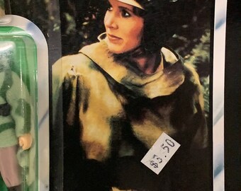 A) 1983 Kenner ROTJ Princess Leia Organa in combat poncho | Barnebys