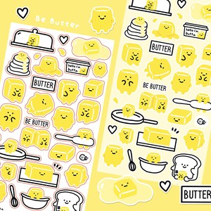 May include: Two sticker sheets with yellow butter-themed illustrations. The stickers feature smiling butter characters, butter pats, and the text "Be Butter" and "Butter". Other images include a butter dish, a pan, and a slice of toast.